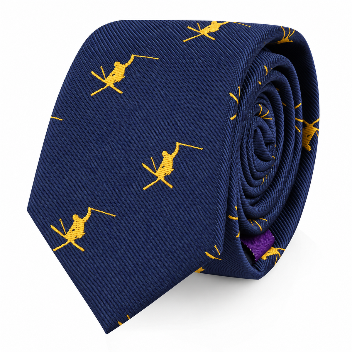 The Ski Tie features a navy blue background adorned with small yellow skiers, neatly rolled and presented on a white backdrop—making it the perfect winter-themed accessory and a thoughtful gift for any skiing enthusiast.