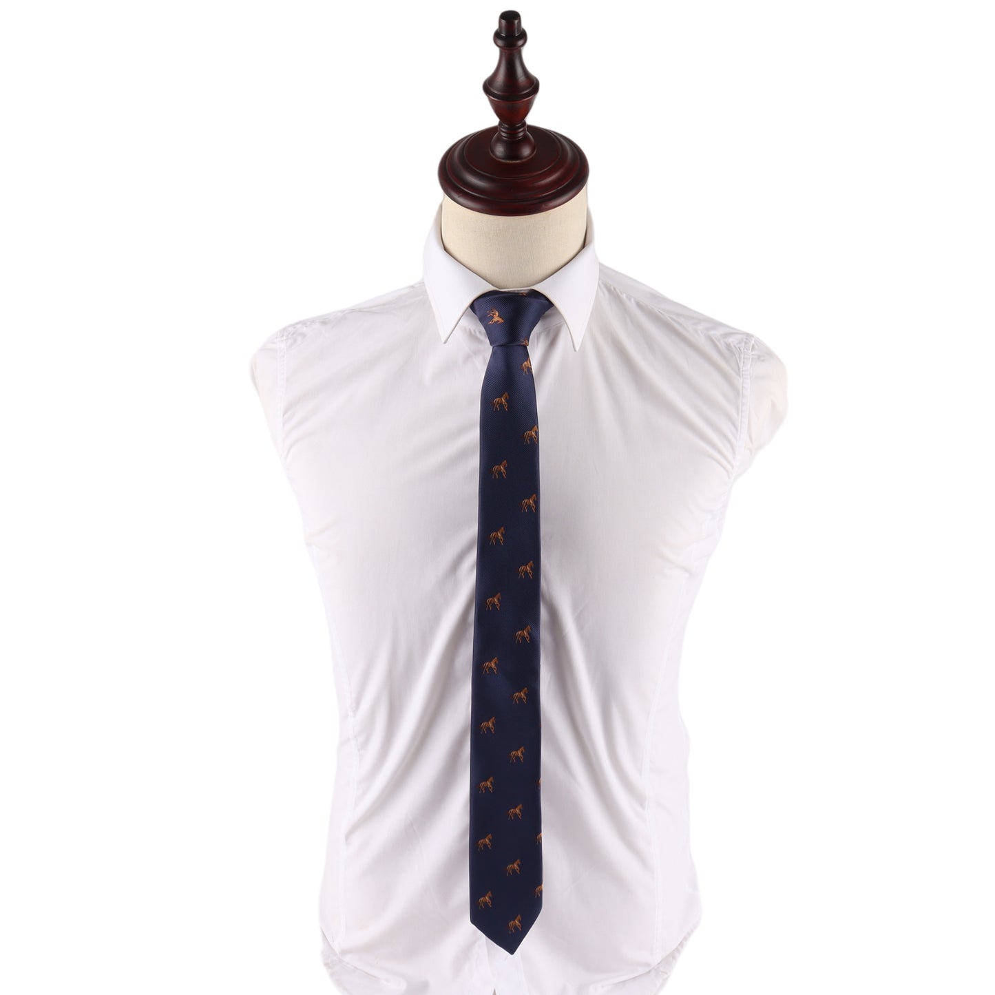 A mannequin torso dressed in a white button-up shirt and the Stallion Horse Skinny Tie, a dark blue tie featuring a small horse pattern.