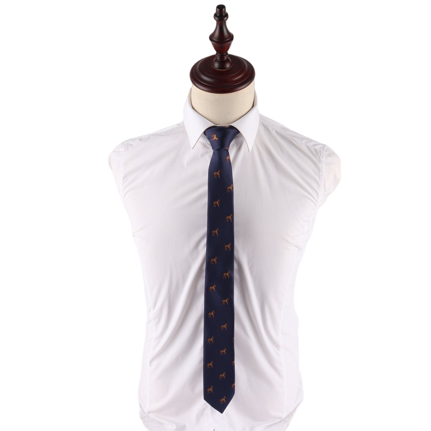 A mannequin torso dressed in a white button-up shirt and the Stallion Horse Skinny Tie, a dark blue tie featuring a small horse pattern.