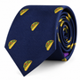 Add a playful, food-inspired touch to your attire with the Taco Skinny Tie—a navy blue tie featuring a repeating pattern of small embroidered taco illustrations.