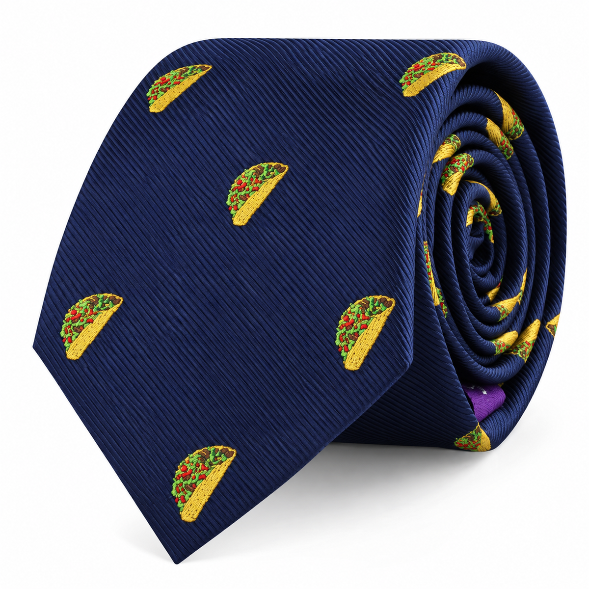 Add a playful, food-inspired touch to your attire with the Taco Skinny Tie—a navy blue tie featuring a repeating pattern of small embroidered taco illustrations.
