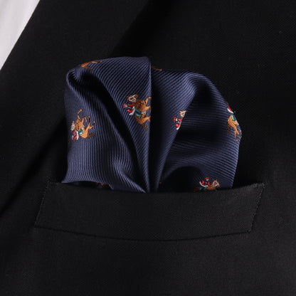 The Thoroughbred Racing Horse Pocket Square, in navy blue with a horse motif, is neatly folded and placed in the breast pocket of a black suit jacket.