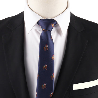 A person wearing a black suit jacket, white dress shirt, and a navy blue Thoroughbred Racing Horse Skinny Tie with a small horse and rider pattern.