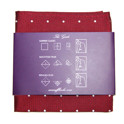 Enhance your style with our Red White Polka Dot Business Tie & Pocket Square Set. The red polka dot pocket square includes a purple guide for Dapper Classic, Mountain Peak, and Winged Puff folds, making it perfect for any business occasion.