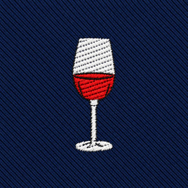 Wine Skinny Tie in navy blue with a diagonal-ribbed texture, featuring an embroidered icon of a wine glass filled with red liquid.