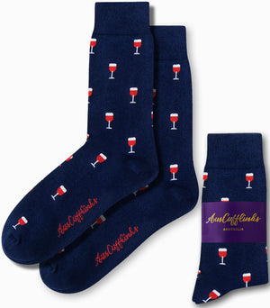 Wine Socks in navy blue, featuring an elegant wine glass pattern, perfect for the vino enthusiast. Accompanied by packaging labeled "AusCufflinks Australia.