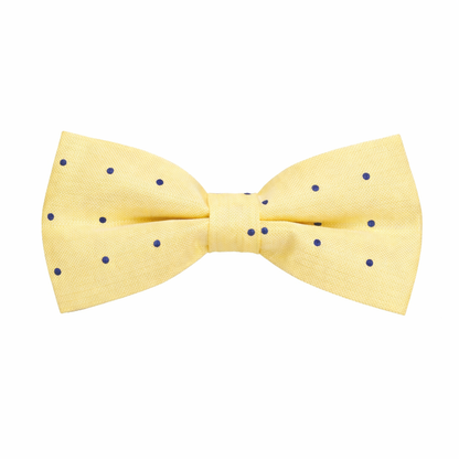 The Yellow Navy Polka Dot Bow Tie features small, evenly spaced navy dots on yellow fabric, making it a stylish addition to any men’s bow tie collection. Shown against a crisp white background.