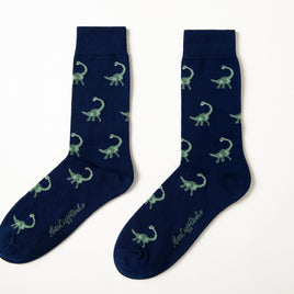 Fun novelty Brontosaurus socks for men featuring green dinosaur design on navy background