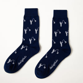 Fun novelty fishing-themed socks for men featuring white fisherman design on navy background