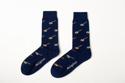 Fun novelty music socks for men featuring banjo instrument design on navy background