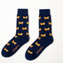 Fun novelty socks for men featuring orange airplane design on navy background