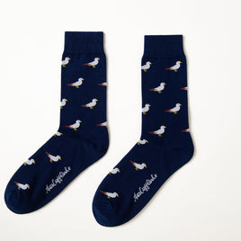 Fun novelty bird socks for men featuring flying seagull design on navy background