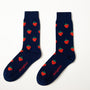 Fun novelty fruit socks for men featuring red strawberry design on navy background