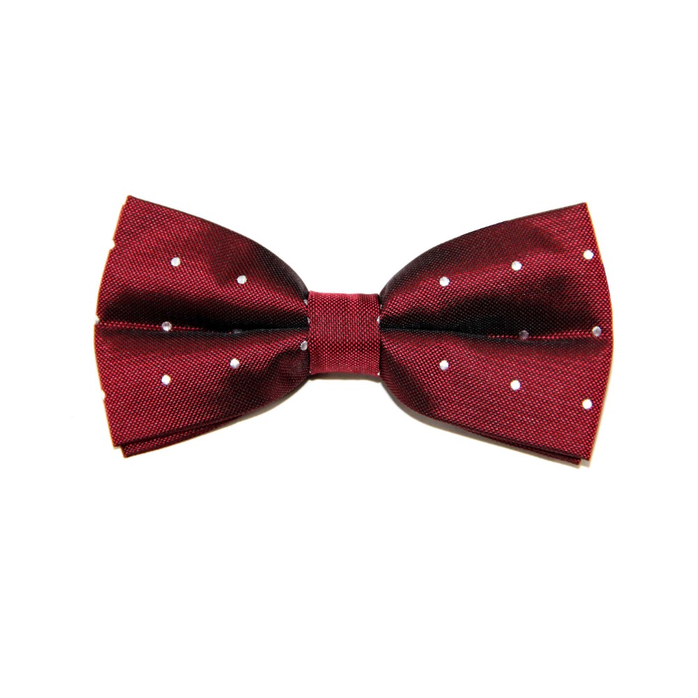 The Red White Polka Dot Bow Tie, set against a plain white background, exudes a perfect holiday style.