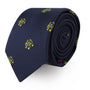 The Musical Note Skinny Tie, featuring a rolled navy blue design adorned with yellow musical notes, effortlessly harmonizes with any look.