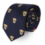 Navy Labrador Dog Skinny Tie featuring a pattern of embroidered dog faces in vibrant yellow and red tones, perfect for enthusiasts of dog-themed fashion.