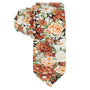 A rolled-up Floral Artisan Skinny Tie featuring a floral pattern with orange, white, and green flowers showcases Nature’s masterpiece in a dapper design.