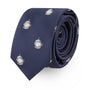 A rolled-up Spaceman Skinny Tie in navy blue with small embroidered helmet designs to elevate your style.