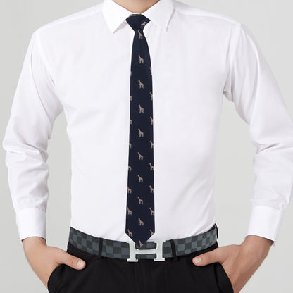 A person wearing a white dress shirt, black pants, and a checkered belt stands tall with their hands in their pockets, exuding understated sophistication accentuated by a dark Giraffe Skinny Tie.