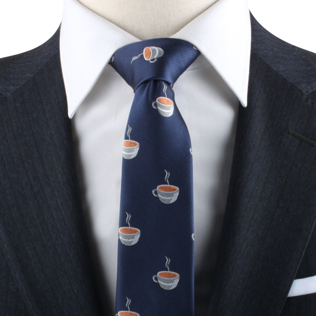 A mannequin wearing a Coffee Skinny Tie with coffee cups on it.