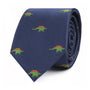 A rolled-up Stegosaurus Skinny Tie, blending prehistoric allure with modern elegance.