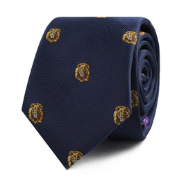 The King Lion Skinny Tie is a rolled-up navy blue accessory beautifully adorned with small yellow and brown lion head motifs, symbolizing leadership and courage.