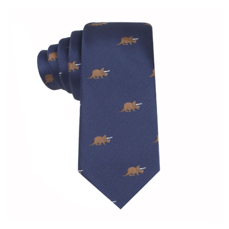 A Triceratops Skinny Tie featuring a repeating pattern of small brown triceratops dinosaurs, blending modern elegance with prehistoric charm.