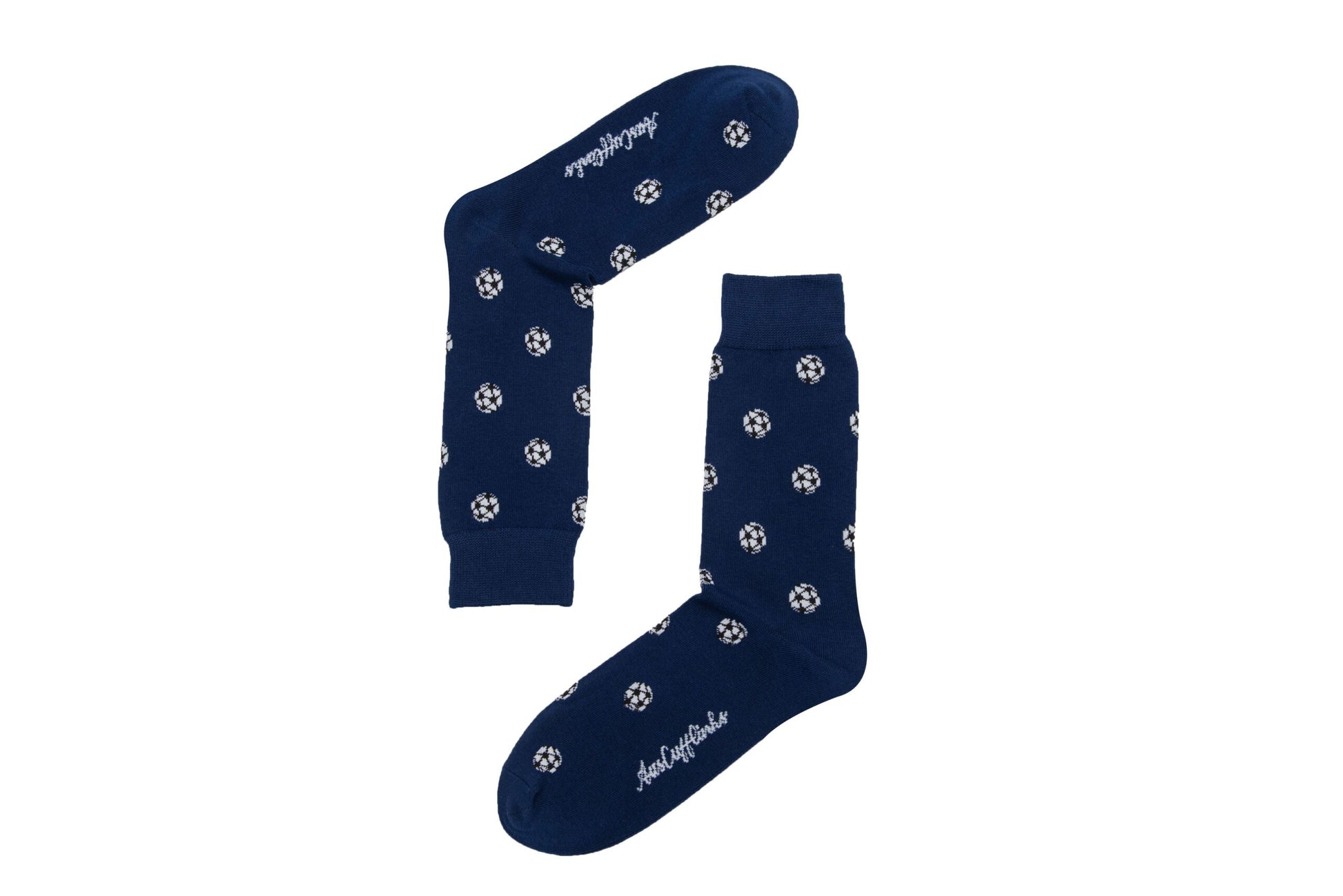 Two navy blue Soccer Socks featuring a pattern of soccer balls and the words "handcrafted" near the toes are arranged in a geometric shape on a white background. These socks offer goal-worthy comfort with every step you take.