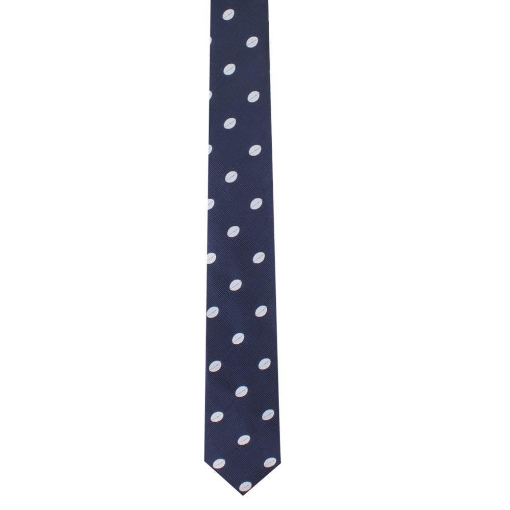 A Rugby Skinny Tie with a pattern of white oval polka dots, embodying rugged athleticism, displayed against a plain white background.