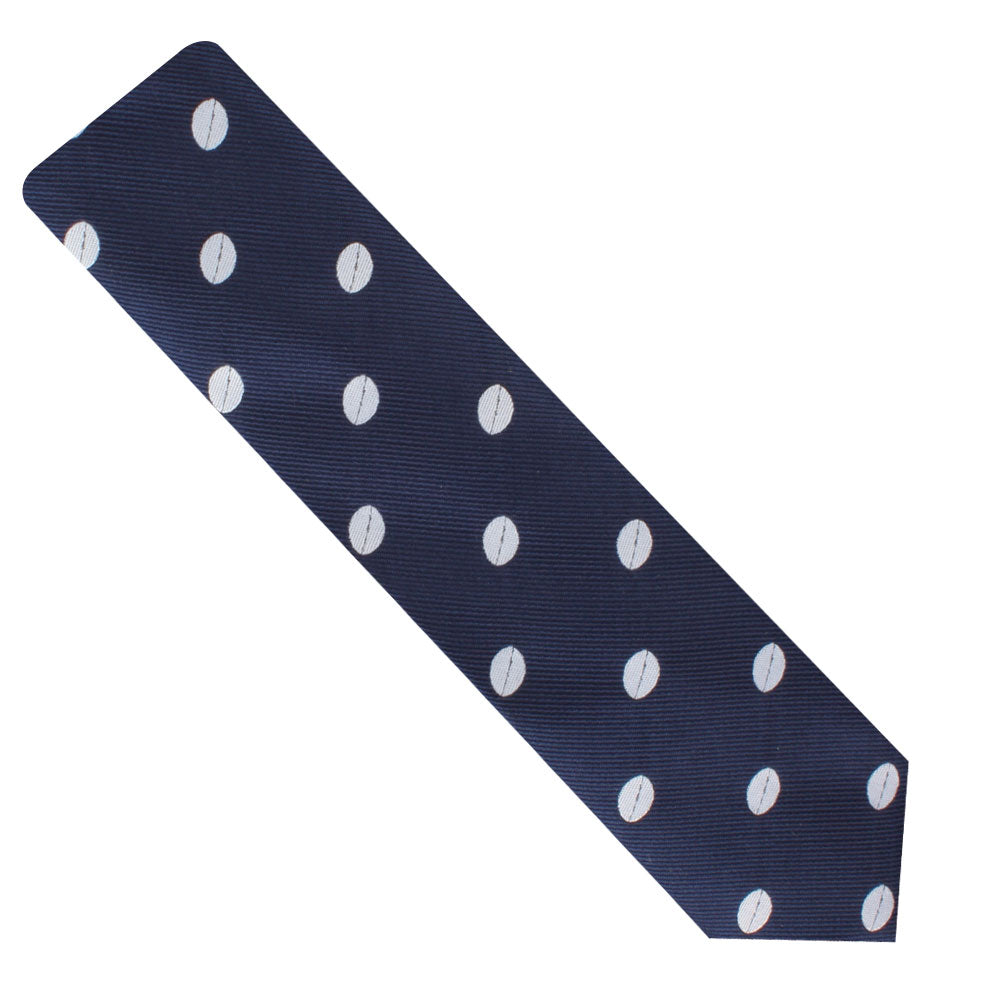 Rugby Skinny Tie with a pattern of white polka dots, displayed on a plain white background, exemplifies rugged athleticism.