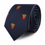 The Fries Skinny Tie, featuring a sleek black design adorned with small images of red and yellow French fry containers throughout the fabric, exudes a touch of modern sophistication.