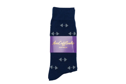 A navy gym sock with a purple logo on it.