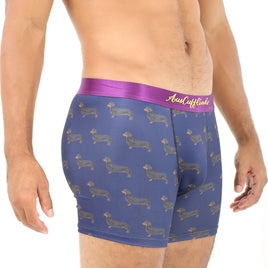 A man wearing a long comfort Sausage Dog Underwear with dachshunds on it.