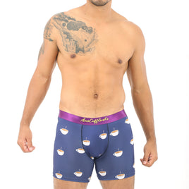 A man experiencing maximum coziness in his Coffee Underwear with a cupcake print.