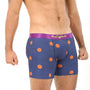 A person wearing Basketball Underwear in blue with orange basketball patterns, ideal for providing ultimate comfort both on and off the court.