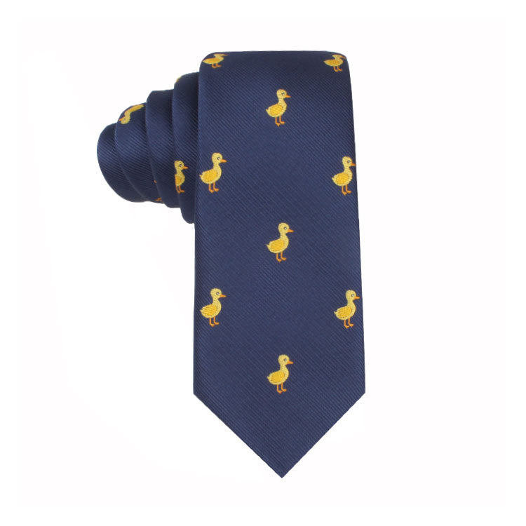 A Duck Skinny Tie featuring a duck pattern of small, yellow ducks exudes both style and cuteness.