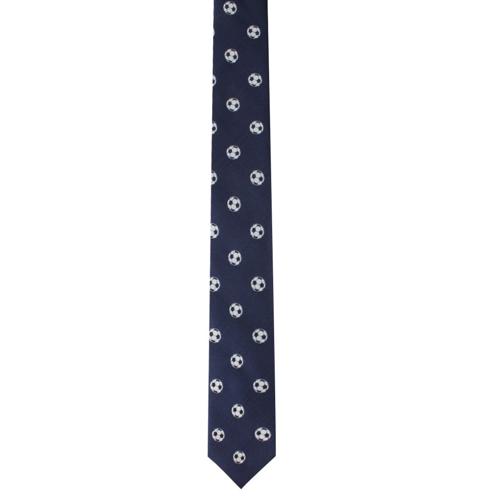 A dark blue Soccer Skinny Tie with a pattern of small white and black soccer balls, exuding timeless class.