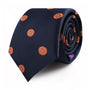 An Orange Skinny Tie, rolled up, bursting with vibrant charm.