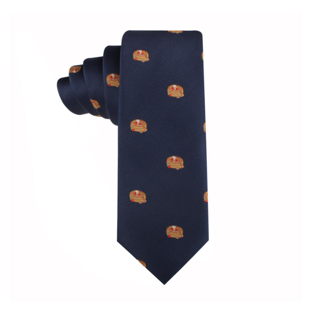 Pancakes Skinny Tie with repeating patterned emblem design on a white background.