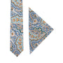 Discover the excellence of our Blue Paisley Skinny Necktie and Pocket Square Set, showcasing vivid orange and green highlights on a fresh white background.