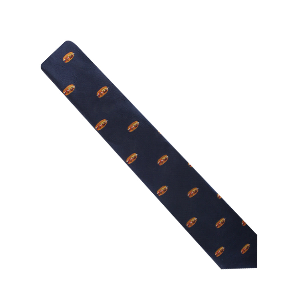 The Pork Roll Skinny Tie, blending modern charm with tradition, features a repeated pattern of a golden-colored crest.