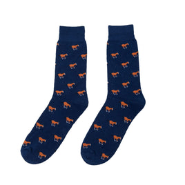 A pair of Horse socks with orange foxes on them.