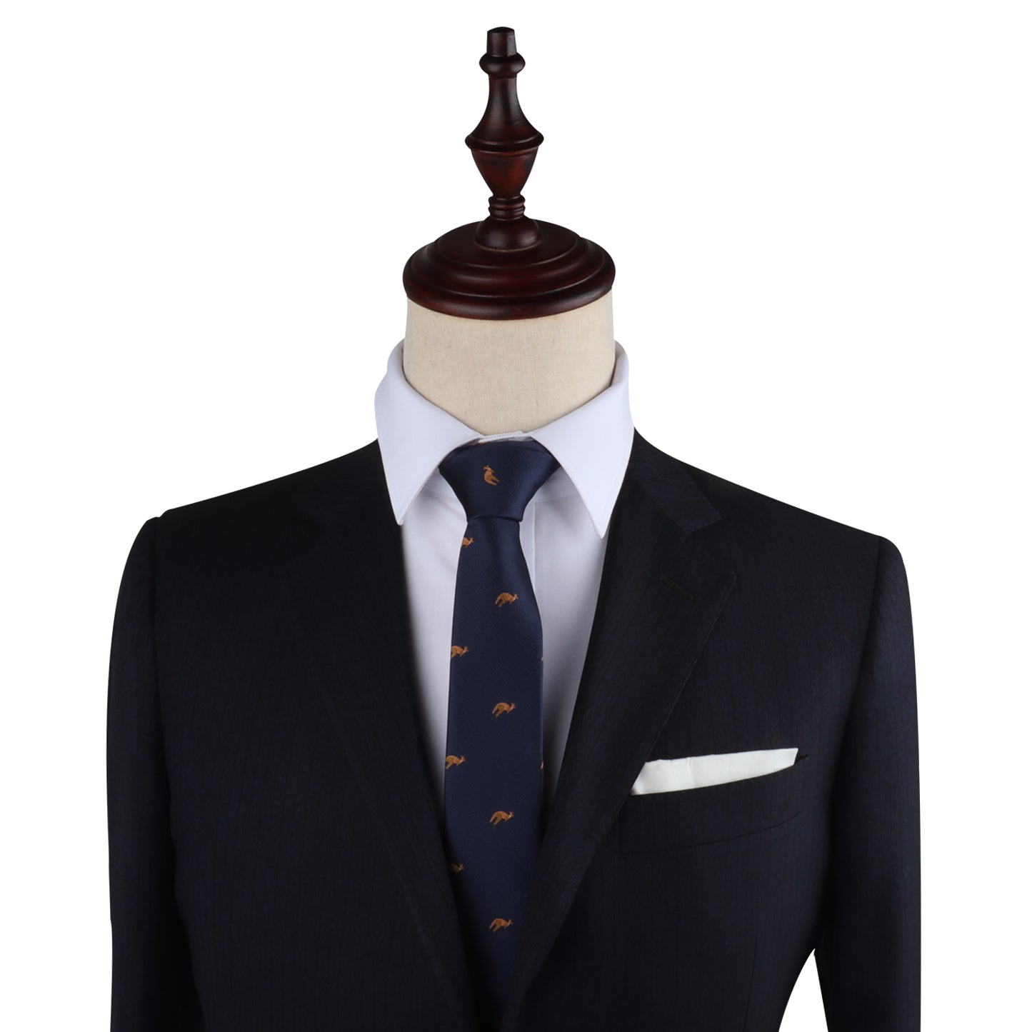 A dress form draped in a dark suit, white shirt, and the Kangaroo Skinny Tie with a small pattern, accented by a white pocket square, epitomizes unmatched elegance against a plain white background.