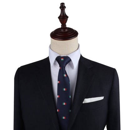 Mannequin exuding elegance in a black suit and white shirt, complemented by an Italian Mexican Flag Skinny Tie adorned with small flag patterns, symbolizing a fusion of cultures.