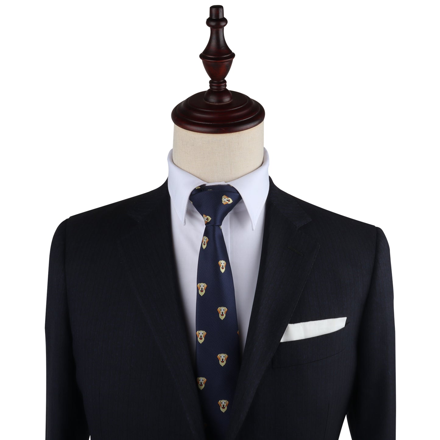 Against a white background, a mannequin showcases a dark suit jacket, white shirt, and patterned dark blue tie—almost as stylish as the Labrador Dog Skinny Tie.