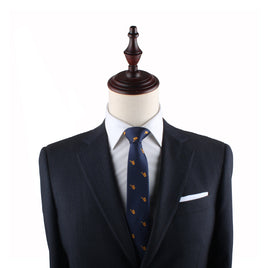 Navy blue suit jacket with a Saxophone Skinny Tie on a mannequin torso.