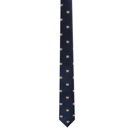 The TV Skinny Tie is a dark blue necktie adorned with small, evenly spaced shield patterns, adding an elegant touch to any ensemble.