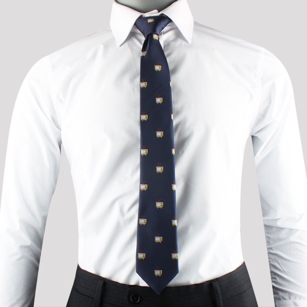 The person exudes elegance in a white dress shirt paired with the TV Skinny Tie in blue pattern.