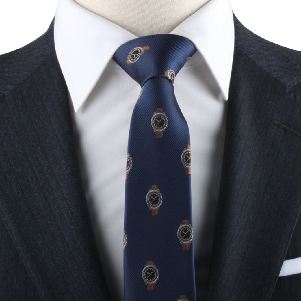Close-up of a mannequin dressed in a dark suit, white shirt, and a blue Watch Skinny Tie, exuding timeless elegance.