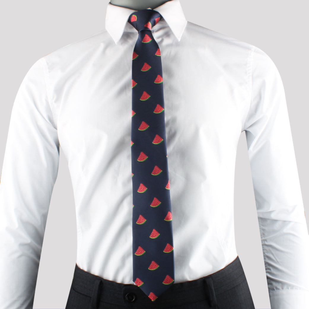 A person wearing a white dress shirt and dark pants, exuding summertime freshness with a Watermelon Skinny Tie.